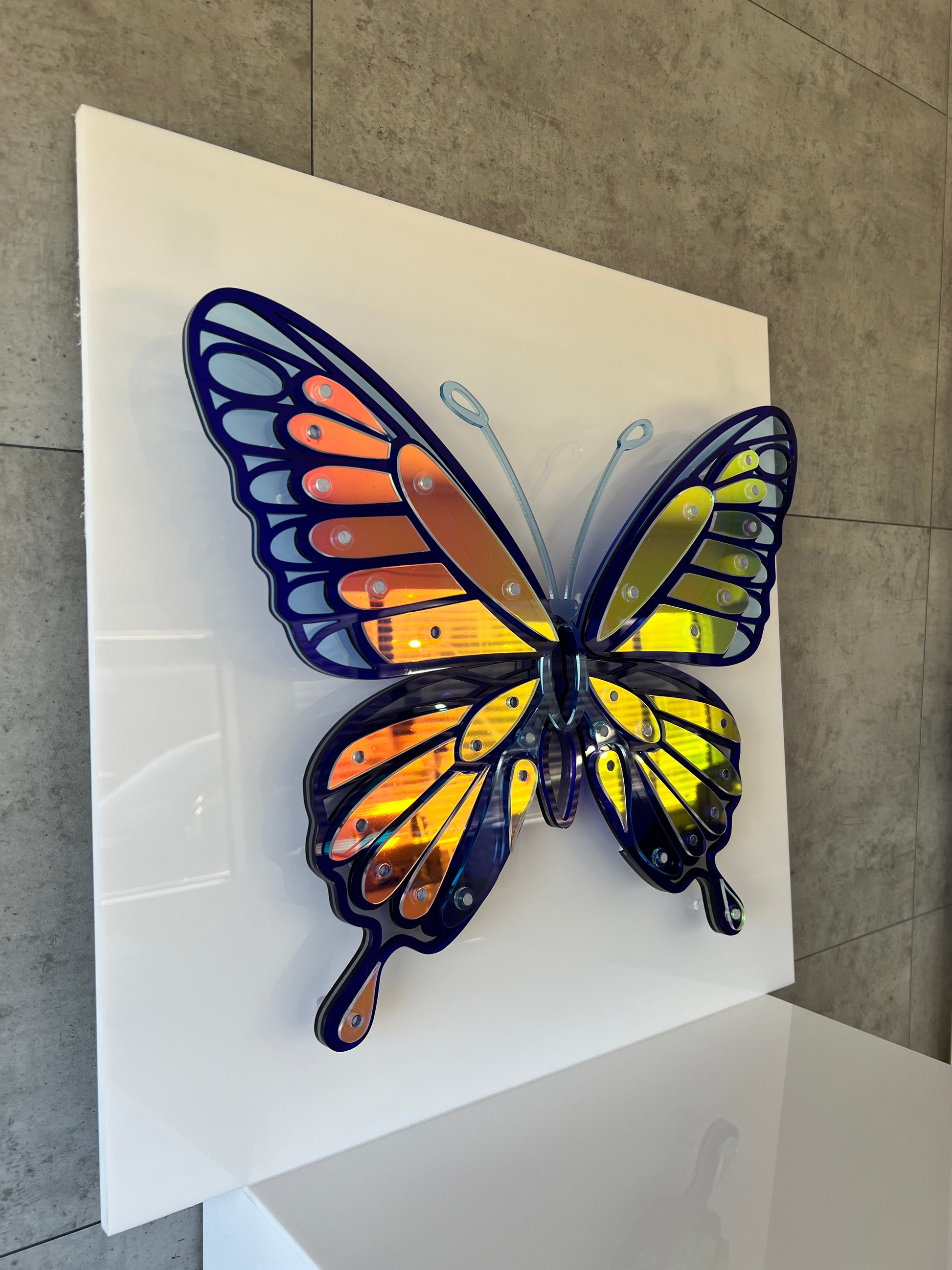Blue Butterfly wall art detail showing color-shifting iridescent finish