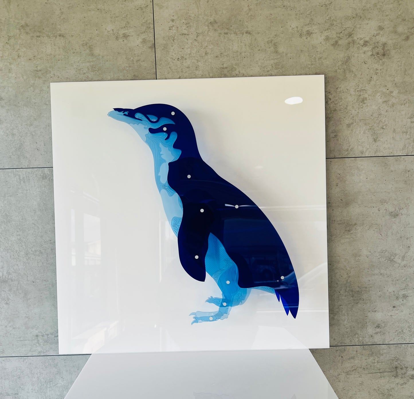 Blue Penguin 3D art showing vibrant blue layered Perspex