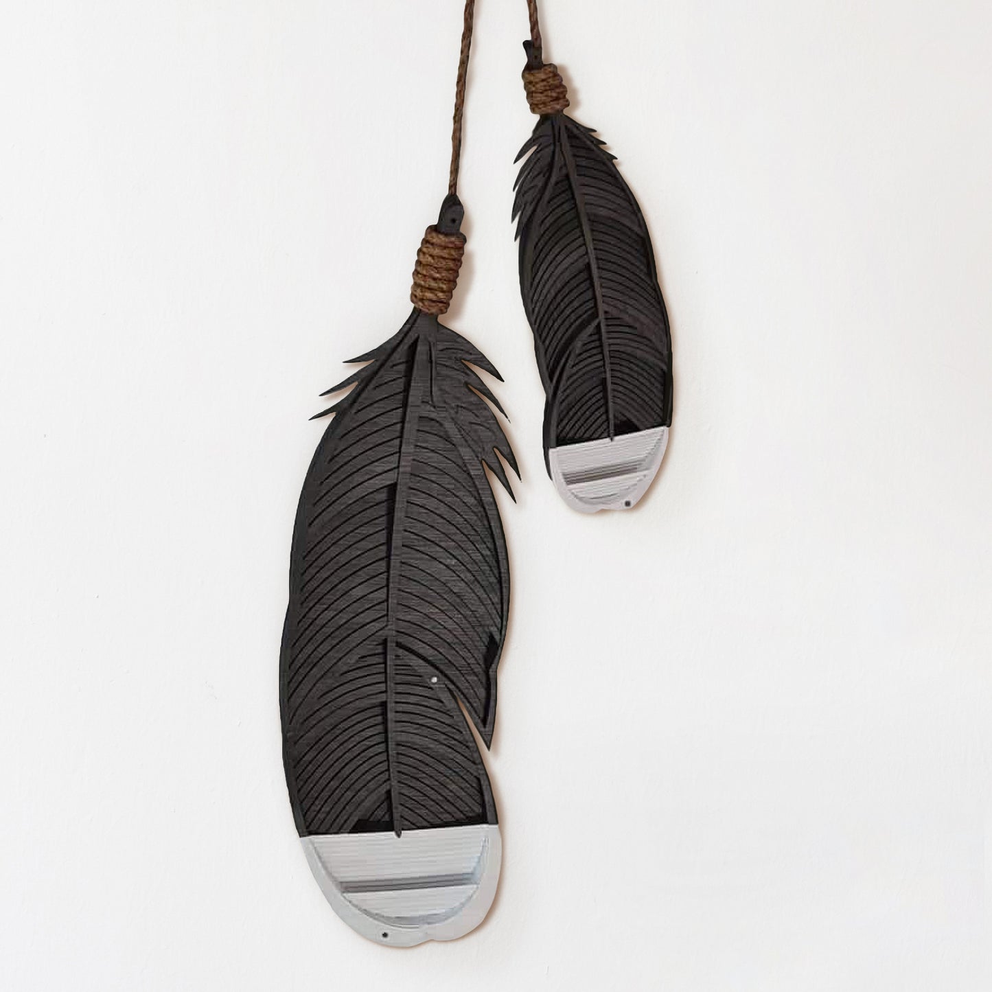 Double Huia feather wall art with 13 hand-painted bamboo layers and rope hangers