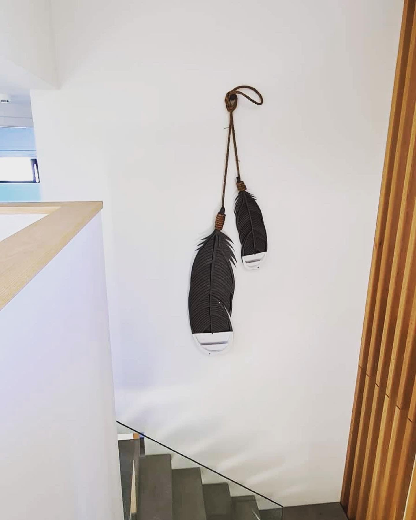 Huia feather detail showing bamboo layers and painted feather texture