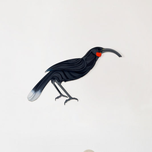 Hand-painted Huia bird wall art with black and white laser-cut bamboo detail