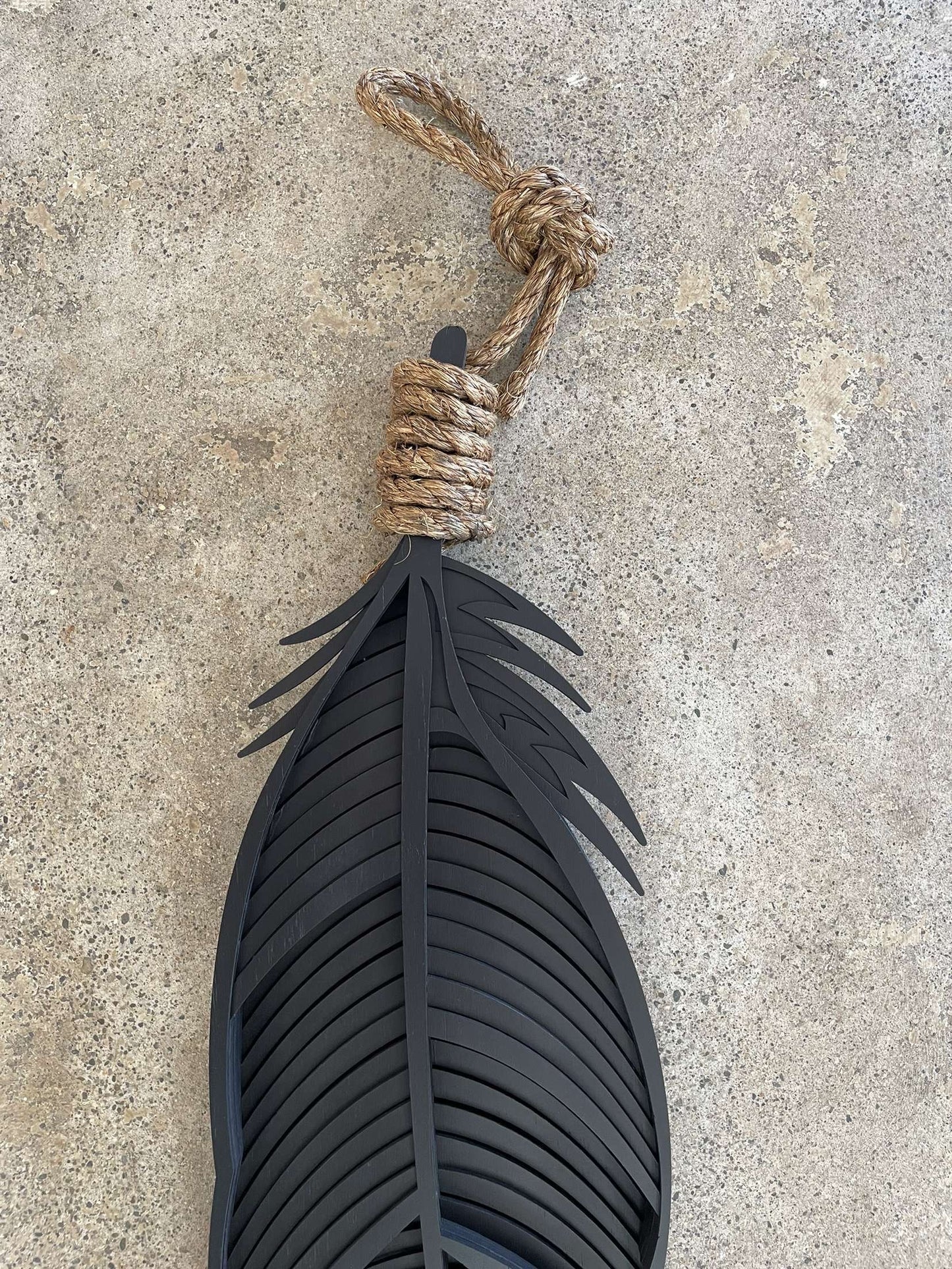 Huia feather detail showing layered bamboo construction and texture