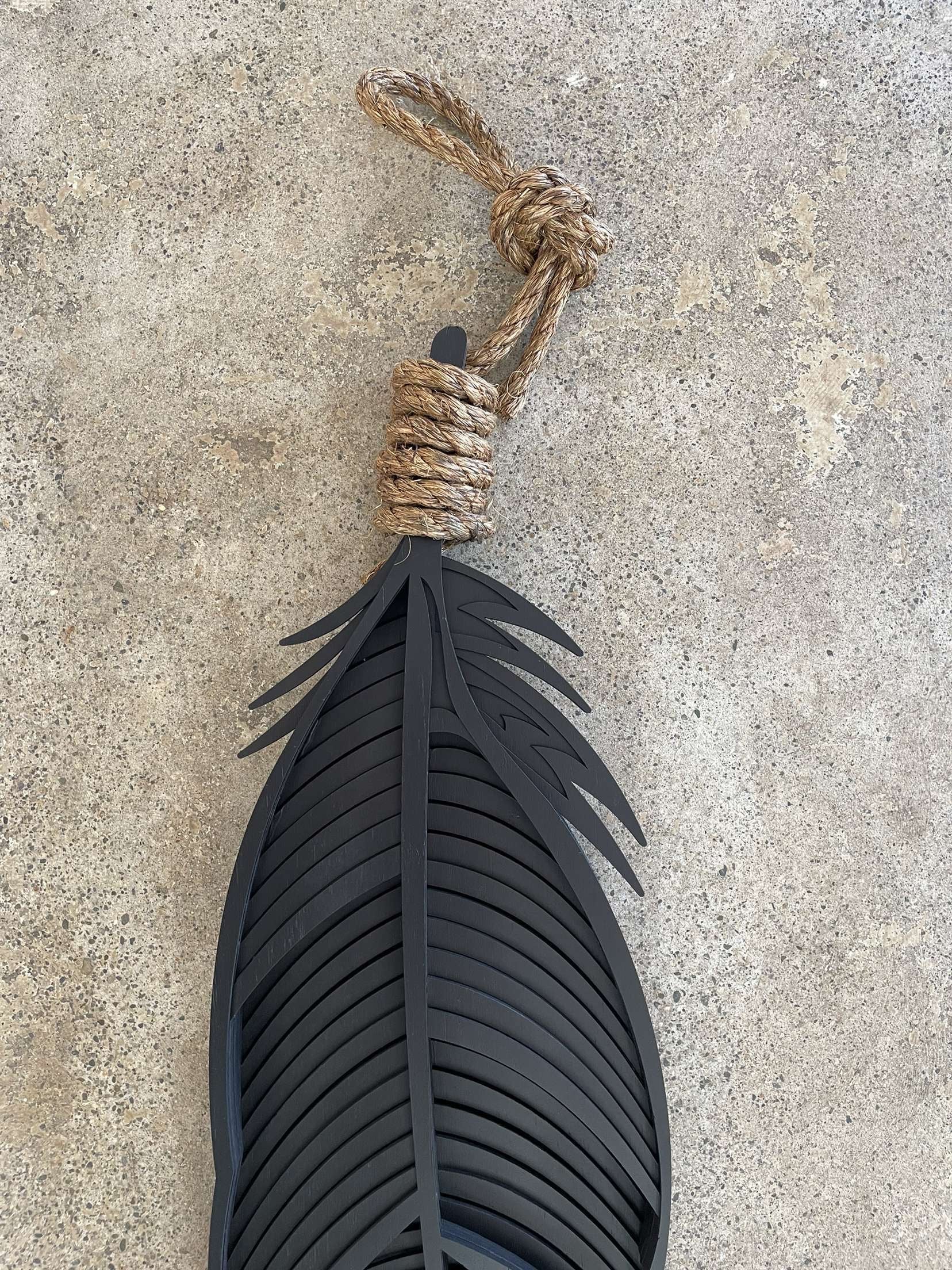 Huia feather detail showing layered bamboo construction and texture