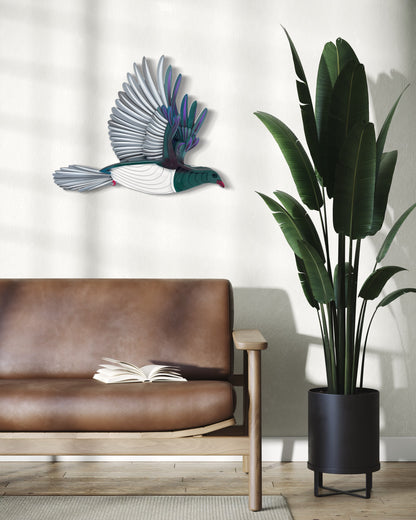 Kererū wall art side view showing hand-painted detail and bamboo layers