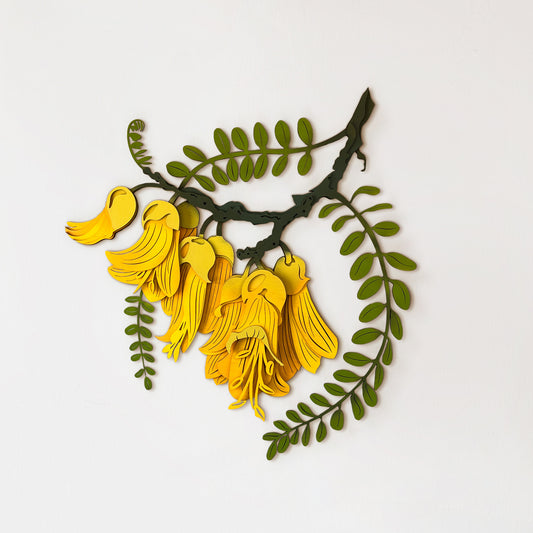 Bright yellow Kōwhai flower wall art with laser-cut bamboo petal