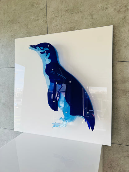 Blue Penguin side view in display case showing 3D depth effec