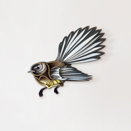 Hand-painted Fantail bird wall art in earthy brown tones with laser-cut detail